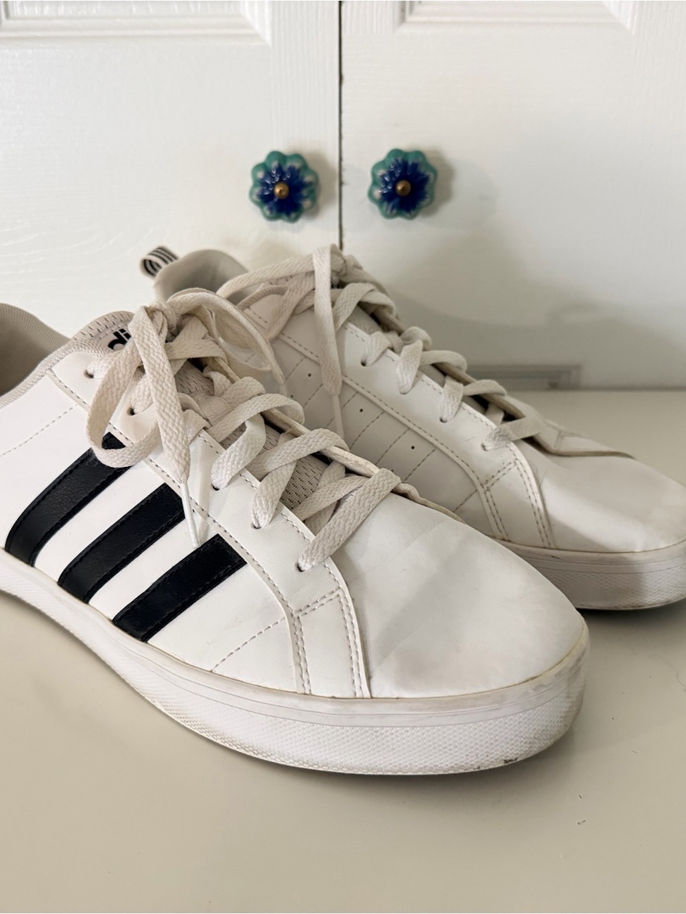 Classic Adidas White Sneakers with Black Stripes